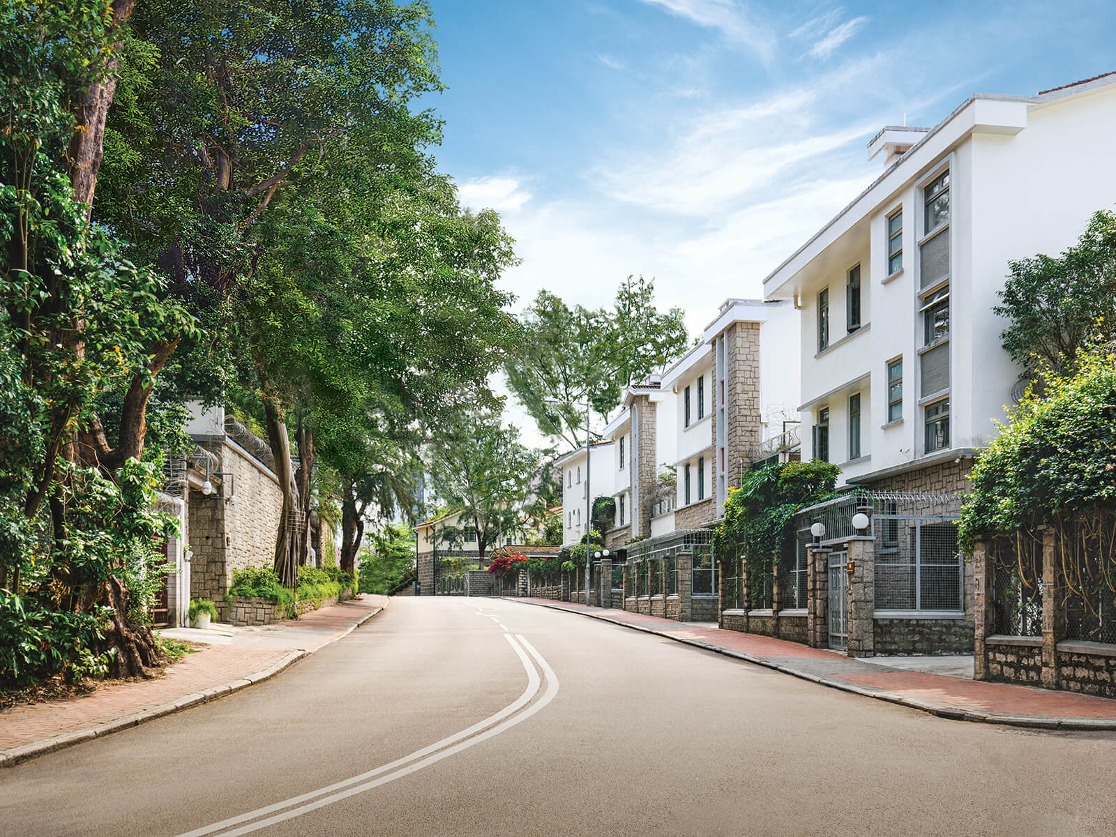 LOW-RISE LUXURY HOUSES ALONG KADOORIE AVENUE Taken at Kadoorie Avenue on 3 April 2019